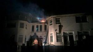 Building on Fire at Night