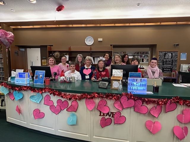 A- Library Staff show their colors - and the desk